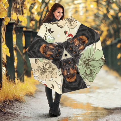 Rottweiler With Flower Print Umbrellas